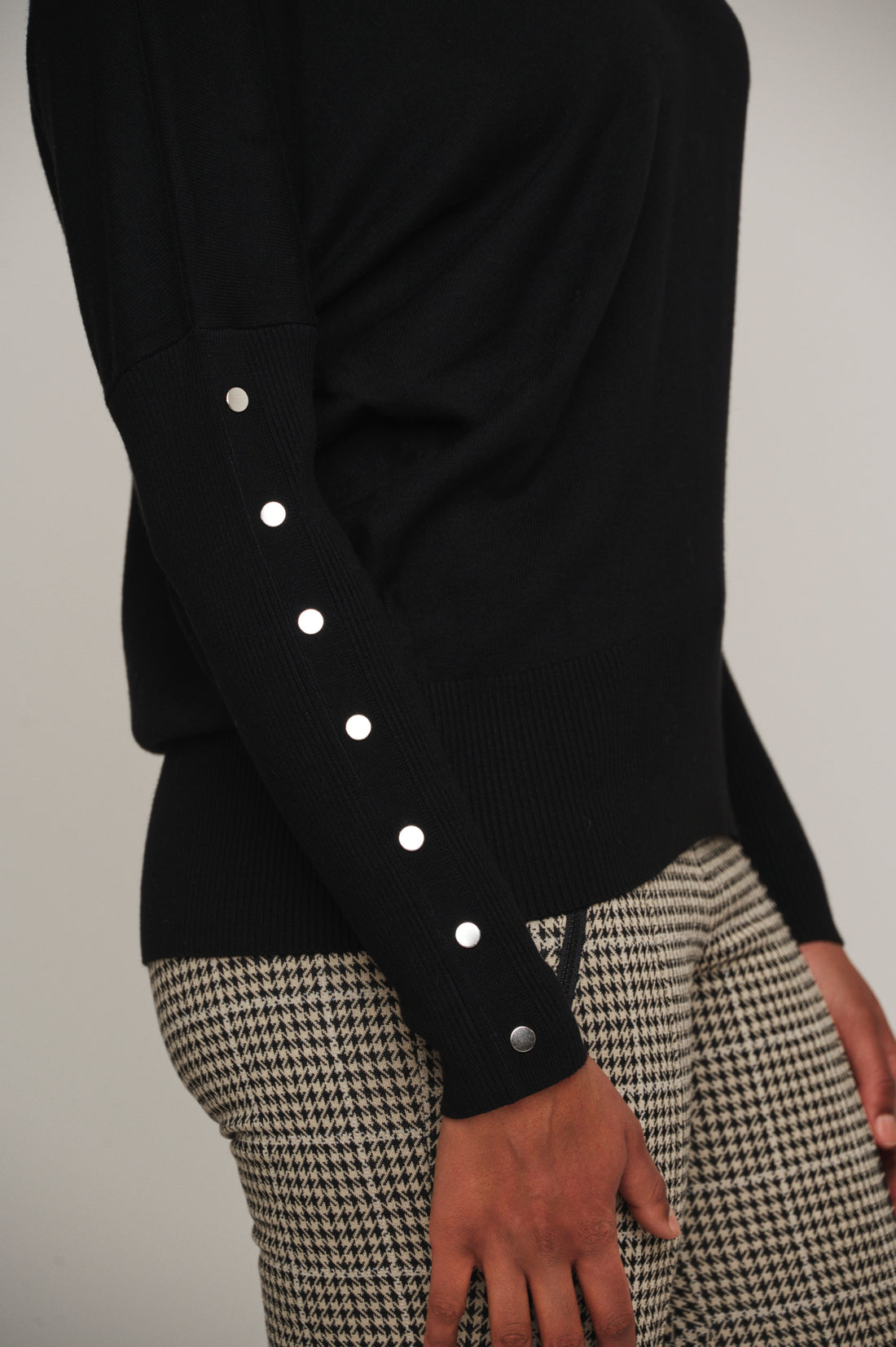 Hinke black boxy sweater with button detail